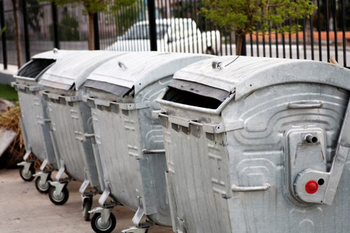 Neasden street with a skip placed for waste disposal