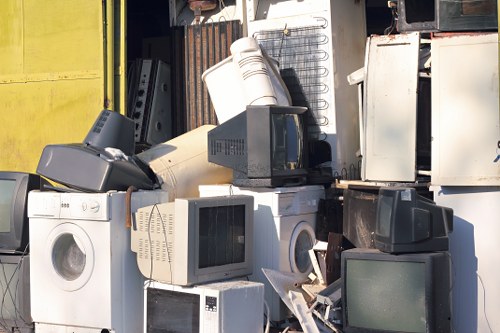 Community members participating in hazardous waste collection event